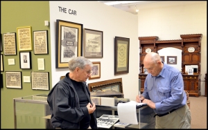 Pullman Historic Foundation President Mike Shymanski, left, talks with travel writer Jim Winnerman at the Pullman Visitor Center.