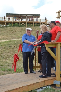 Representatives from the Villages of Park Forest and Matteson and Canadian National Railway cut the ribbon to open the Railfan Park. 