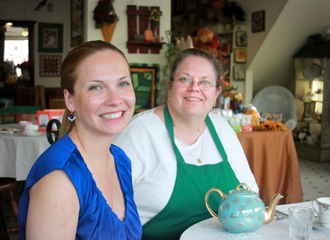 Cindy Vassell, right, poses with Illinois Office of Tourism Director Jen Hoelzle during Hoelzle’s stop at the Pickwick Society Tea Room, Gifts & Antiques on her tour of the Chicago Southland Wednesday, September 11, 2013, in Frankfort, Ill. Vassell is a finalist for a Lincoln Award from the Illinois Office of Tourism. 